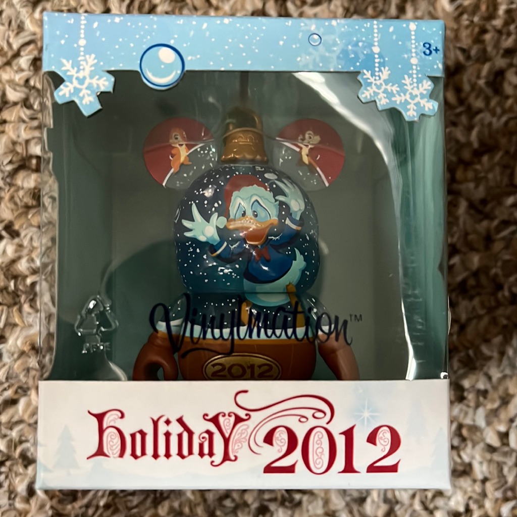Boxed Disney Vinylmation Holiday 2012 figure in its original window packaging, marketplace listing photograph